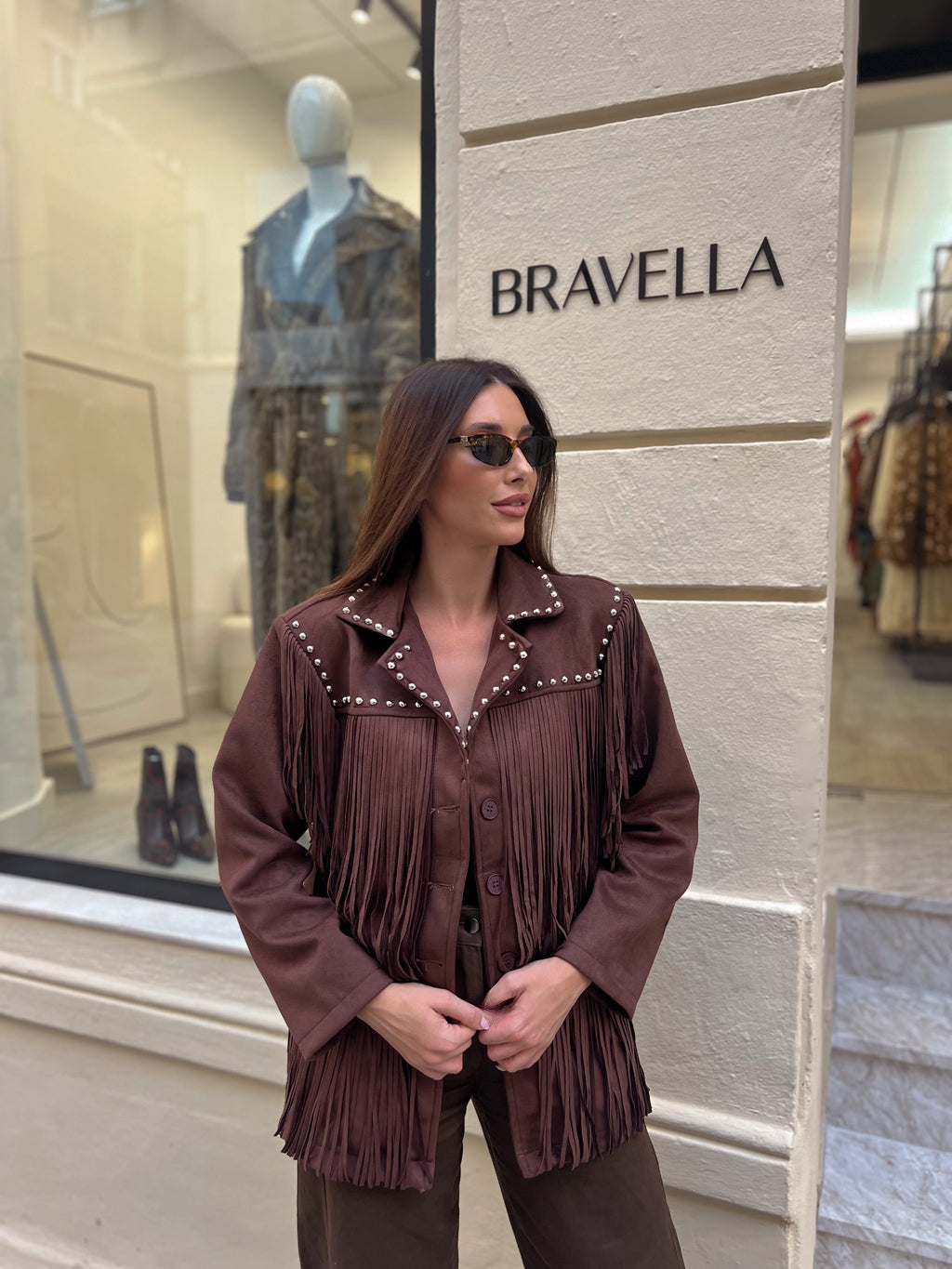 Chaqueta de flecos tachuelas