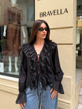 Blusa volantes