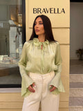 Blusa cuello volante